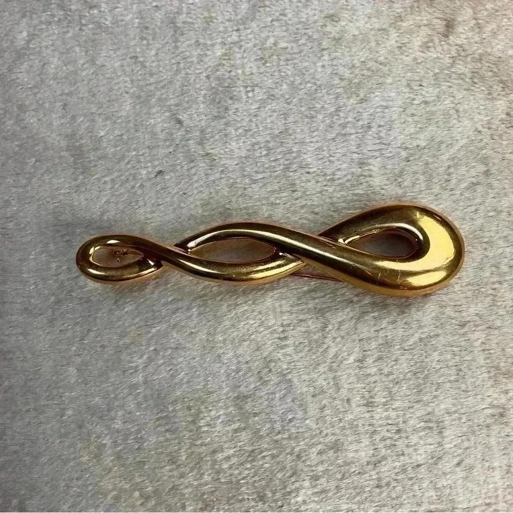 Vintage Gold Tone Monet 3.5in Infinity Brooch